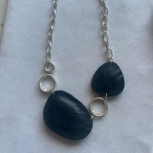 Silver tone and faux leather necklace